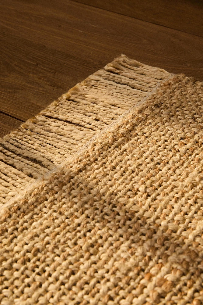 FRINGED JUTE AREA RUG