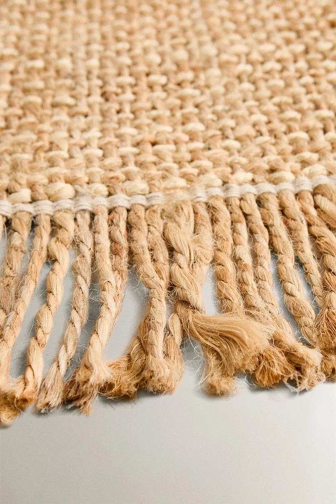 FRINGED JUTE AREA RUG