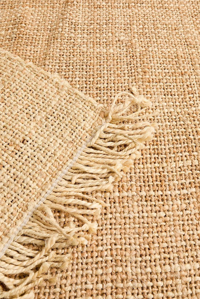 FRINGED JUTE AREA RUG