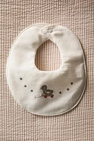 CHILDREN'S BIB WITH DUCKLING APPLIQUÉS