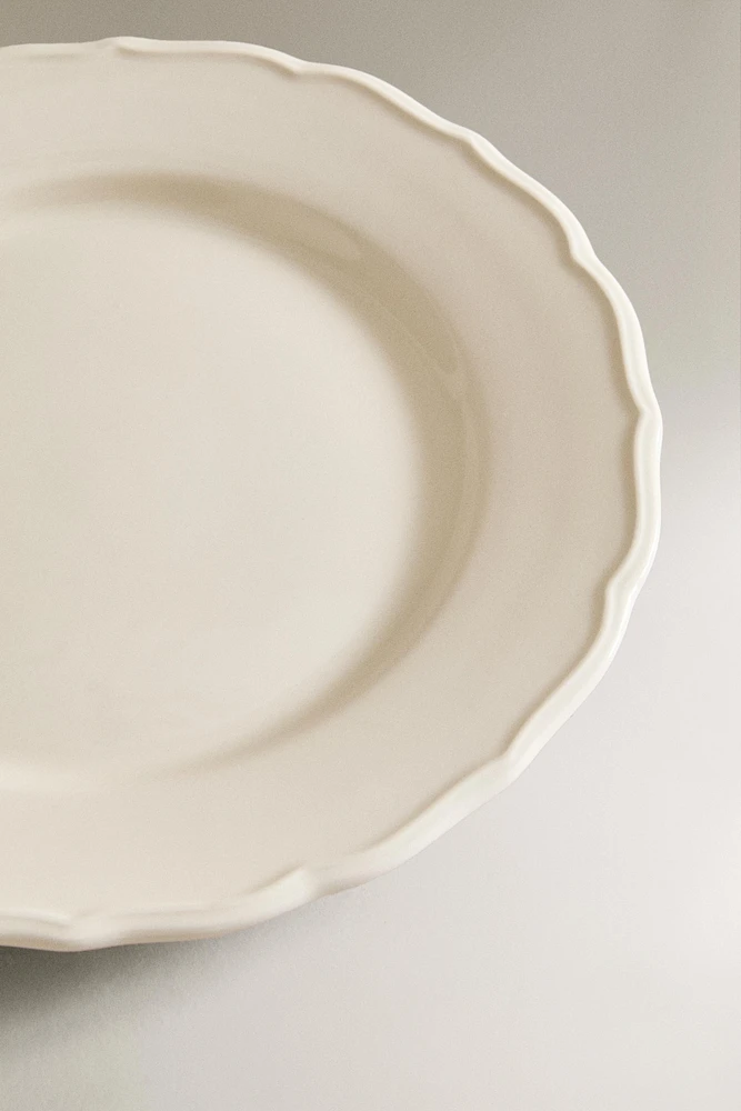 EARTHENWARE DINNER DISH WITH RAISED-DESIGN EDGE