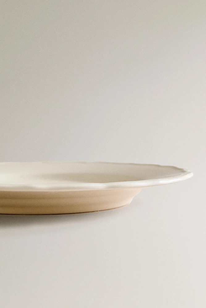 EARTHENWARE DINNER DISH WITH RAISED-DESIGN EDGE