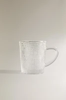 GLASS CUP WITH RAISED DESIGN