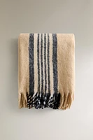 BRUSHED BLANKET WITH CENTRAL STRIPES AND FRINGING