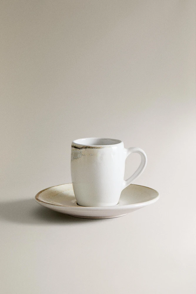 STONEWARE COFFEE CUP AND SAUCER