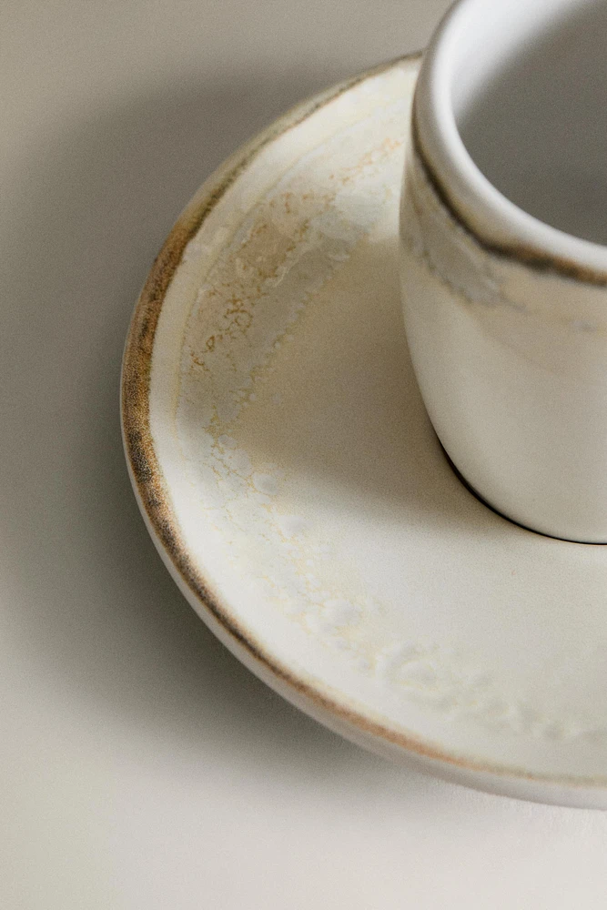 STONEWARE COFFEE CUP AND SAUCER