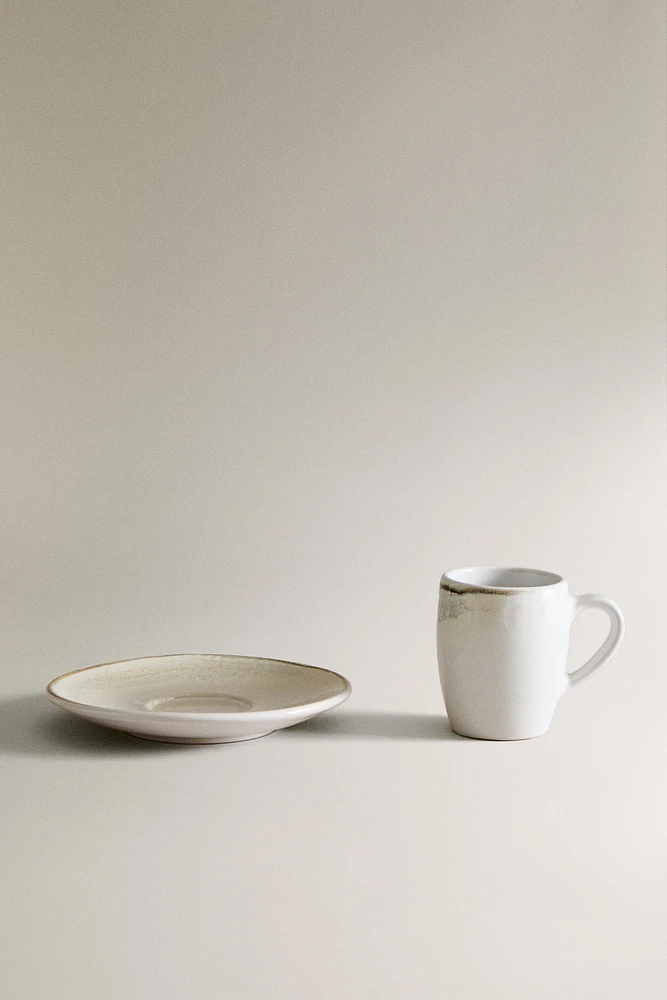 STONEWARE COFFEE CUP AND SAUCER