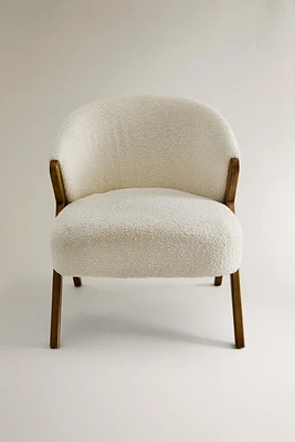 UPHOLSTERED BOUCLÉ ARMCHAIR