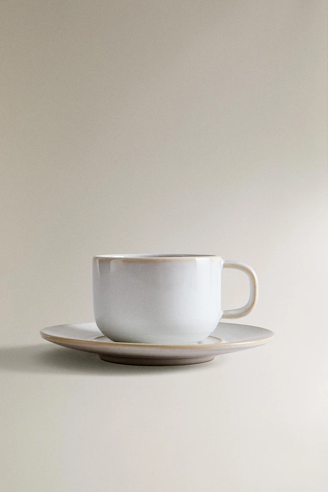 ECRU RIM TEACUP AND SAUCER