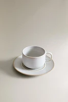 ECRU RIM TEACUP AND SAUCER