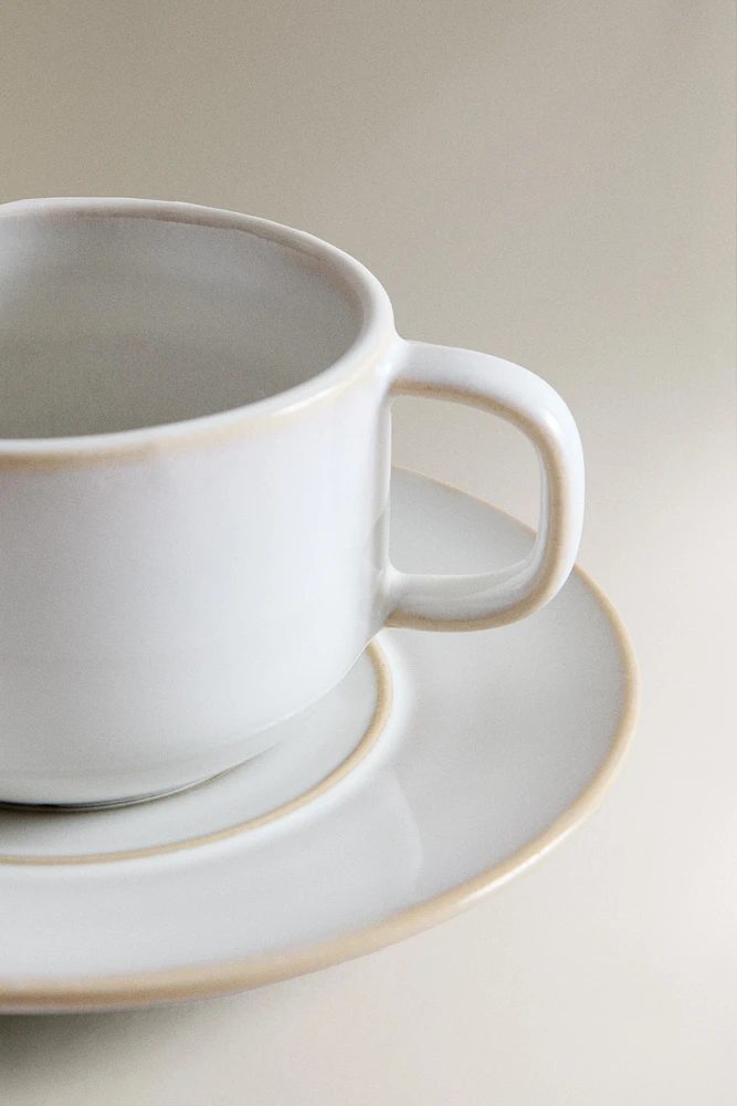 ECRU RIM TEACUP AND SAUCER