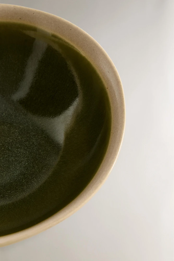 GREEN AND BEIGE STONEWARE BOWL