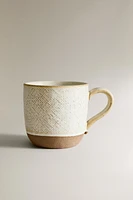 MUG WITH RAISED DESIGN