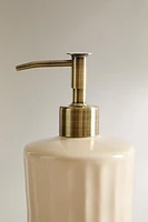 SOAP DISPENSER WITH RAISED DESIGN