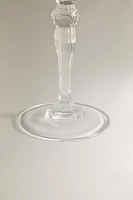 SHOT GLASS WITH A RAISED DESIGN