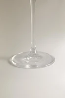 CRYSTALLINE FLUTE GLASS WITH RAISED DESIGN