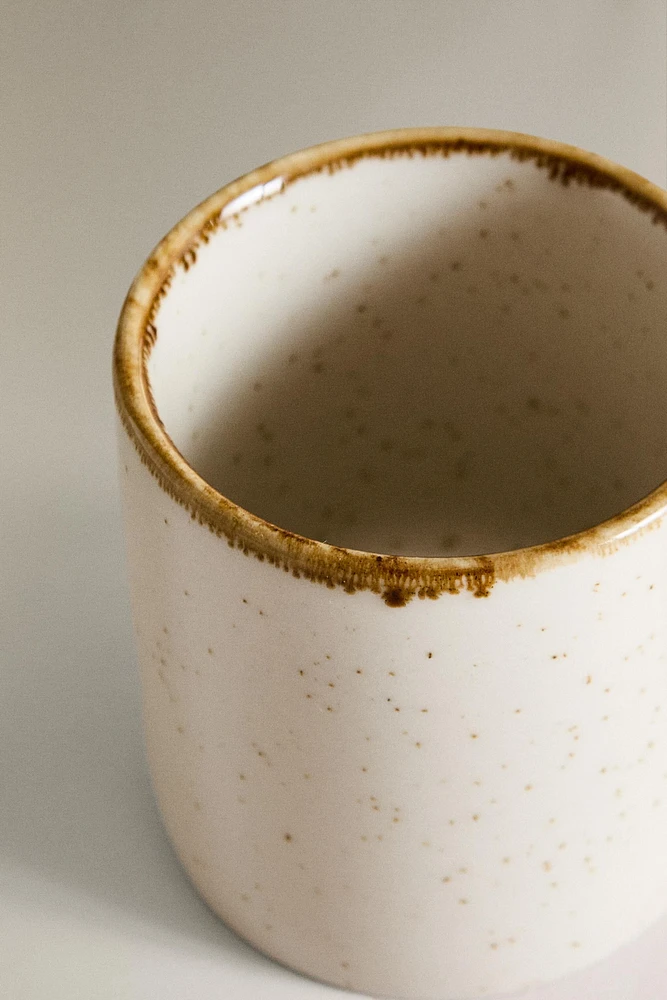 PORCELAIN MUG WITH ANTIQUE FINISH RIM