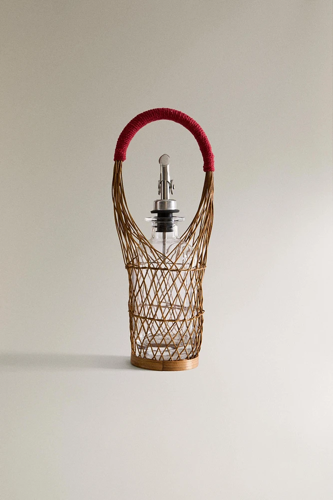 GLASS CRUET WITH RATTAN BASKET