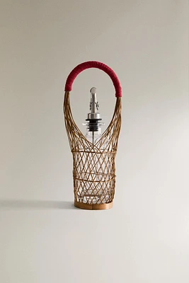 GLASS CRUET WITH RATTAN BASKET