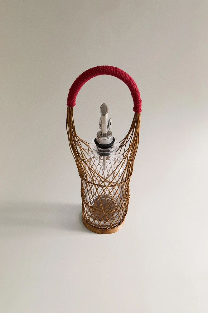 GLASS CRUET WITH RATTAN BASKET