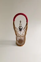 GLASS CRUET WITH RATTAN BASKET