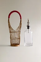 GLASS CRUET WITH RATTAN BASKET