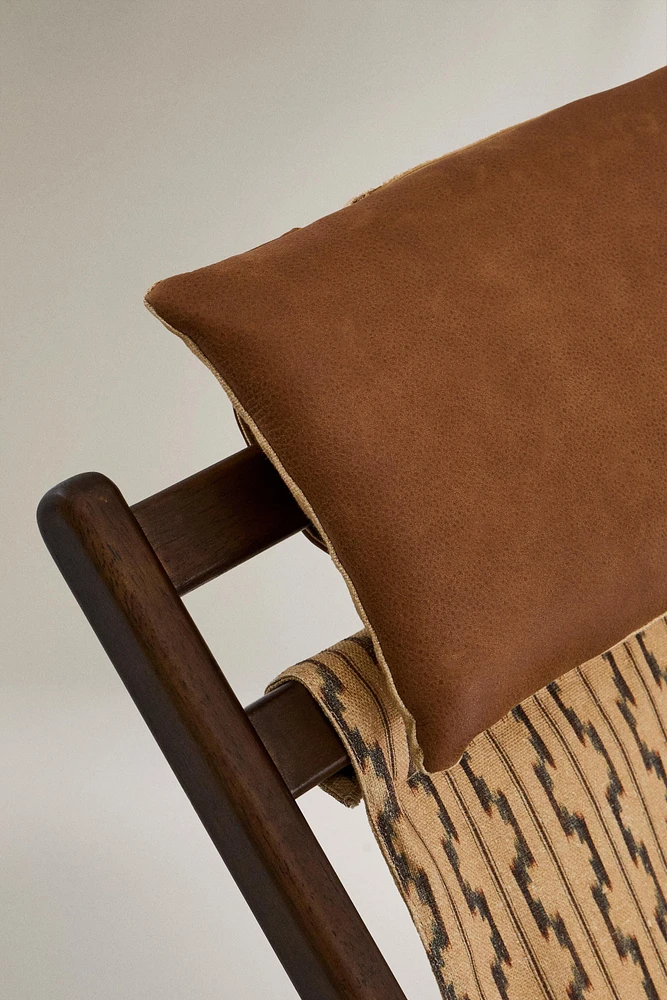 WOODEN LOUNGER WITH LEATHER HEADREST