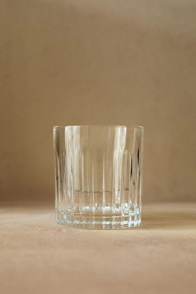 CRYSTALLINE TUMBLER WITH RAISED DESIGN