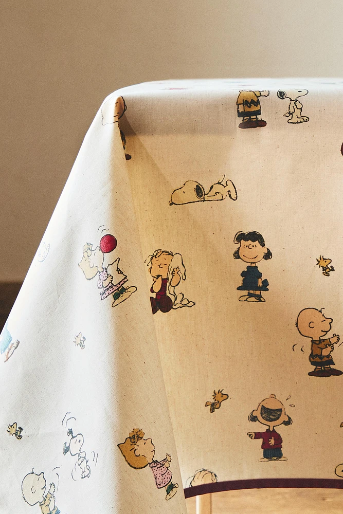 CHILDREN’S PEANUTS™ RESIN-COATED TABLECLOTH