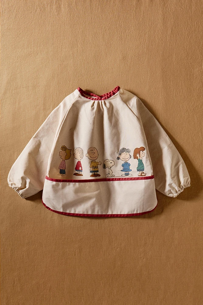 CHILDREN'S PEANUTS™ BIB WITH SLEEVES