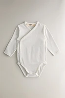 SET OF CHILDREN'S MOON BODYSUITS