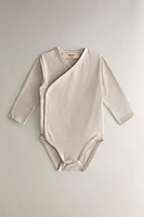 SET OF CHILDREN'S MOON BODYSUITS