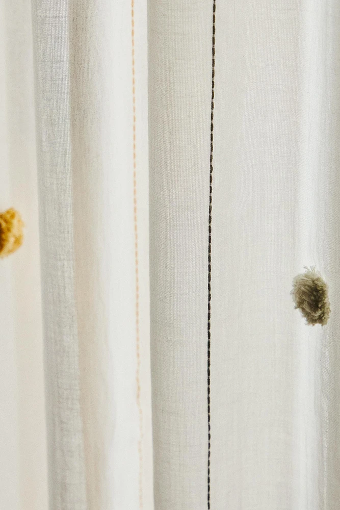 LOW OPACITY TASSEL CURTAIN