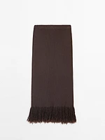 Long knit skirt with fringed hem