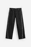 RELAXED FIT FRAYED SEAM JEANS