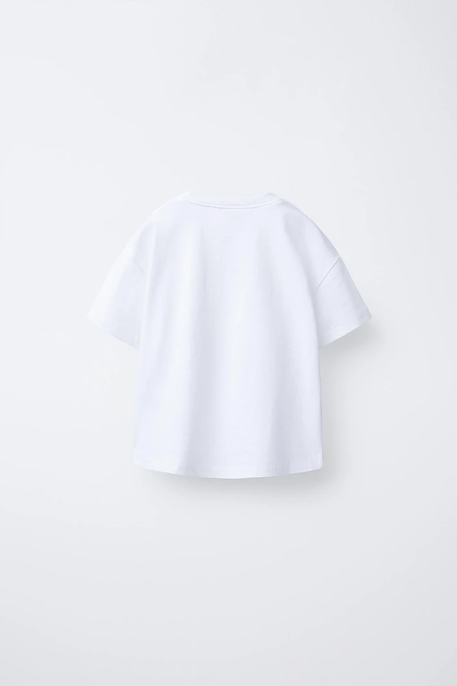 T-SHIRT À POCHE BRODÉE