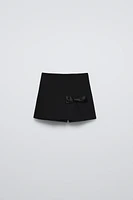 SATIN EFFECT BOW SKORT