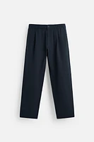 TEXTURED PLEATED PANTS