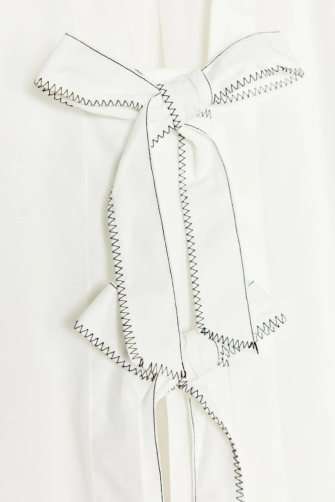 BLOUSE EN POPELINE À LACETS