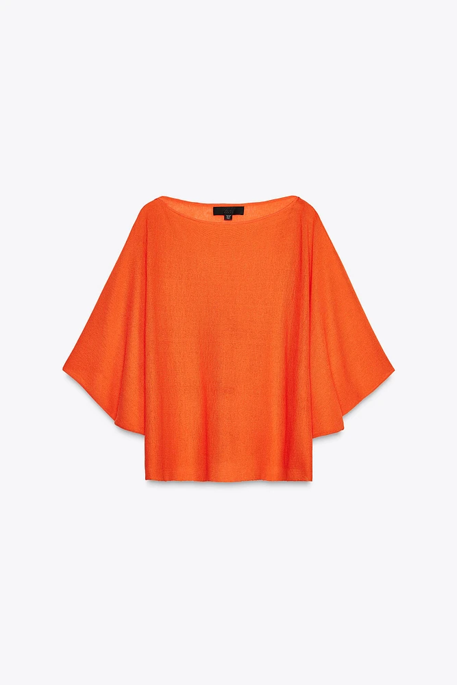 TOP CAPE EN MAILLE UNIE