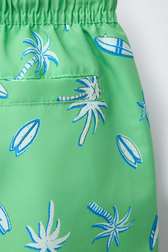 6-14 ANS/ SHORT DE BAIN PALMIERS ET SURF