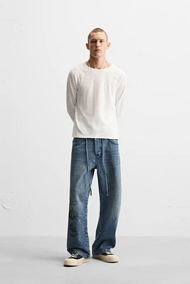 PRINTED BAGGY FIT JEANS X ALL CAPS STUDIO