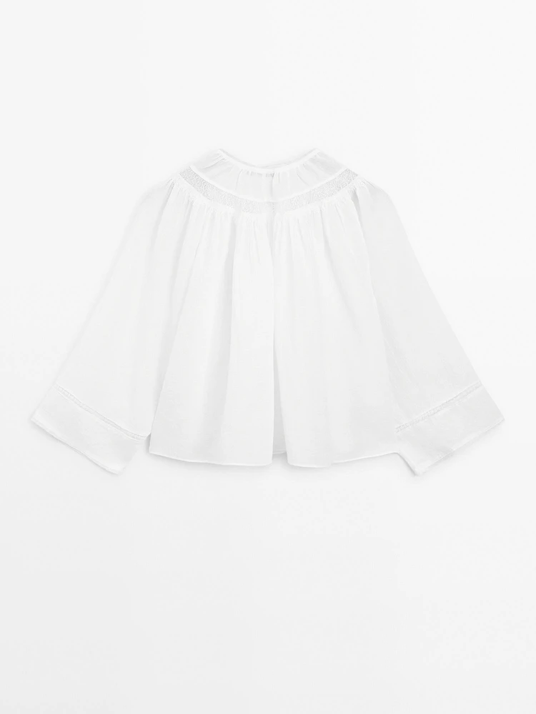 Blouse fluide à dentelle