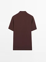 Textured knit short sleeve polo shirt