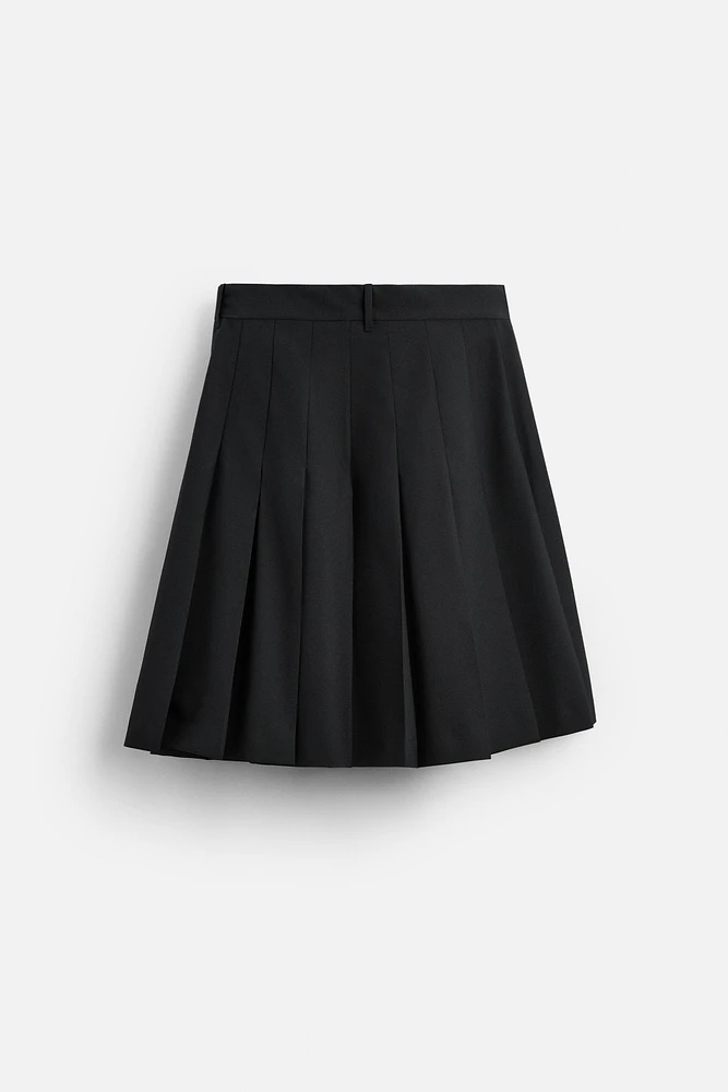 PLEATED WRAP SKIRT LIMITED EDITION