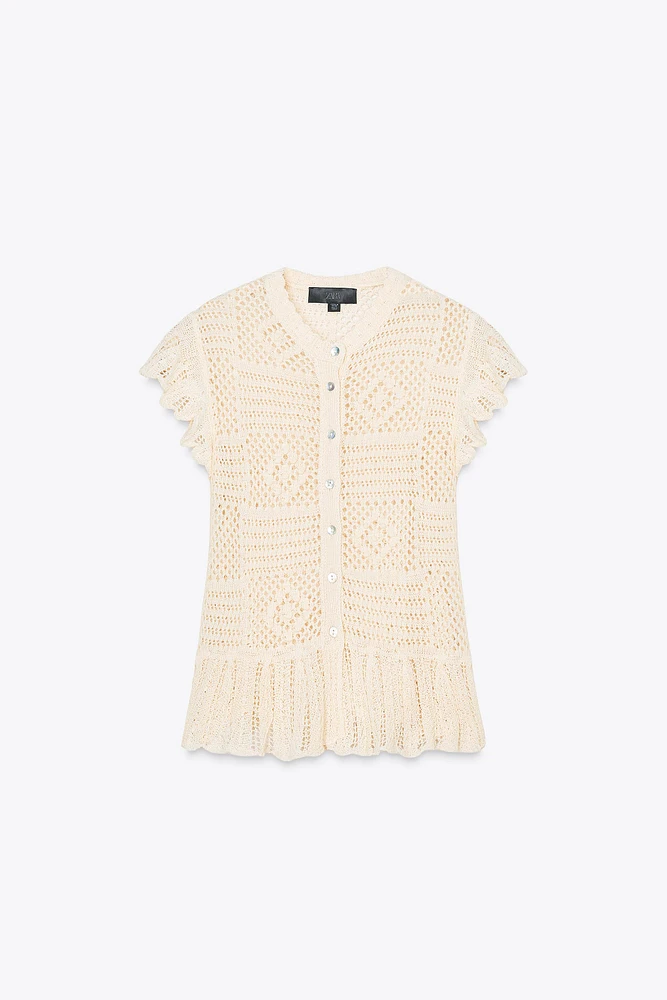 GILET EN MAILLE POINTELLE À VOLANTS