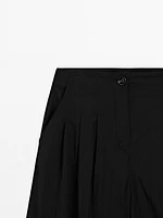 Pantalon palazzo fluide à pinces