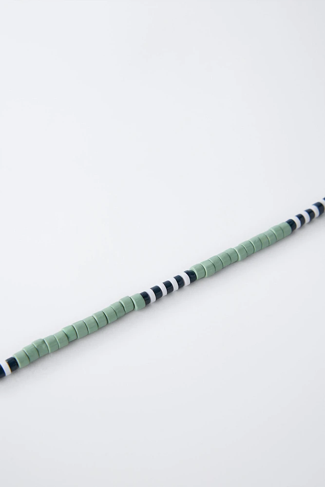 LOT DE DEUX COLLIERS EN BOIS