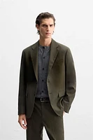 TEXTURED SUIT JACKET