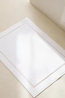 SCALLOPED-EDGE BATH MAT